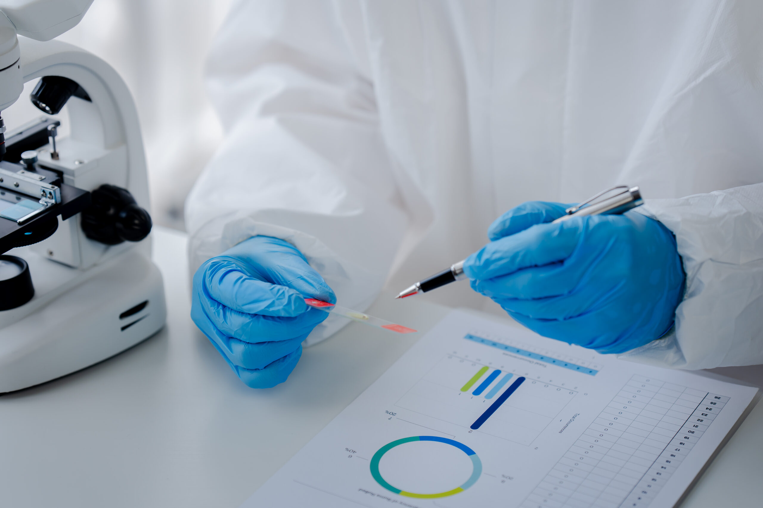 Hand of doctor or research scientist taking a test tube to check data in laboratory biotechnology specialist Ambitious new generation Works with advanced devices